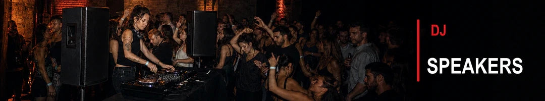 Woman DJ performing with professional PA speakers for a nightclub crowd