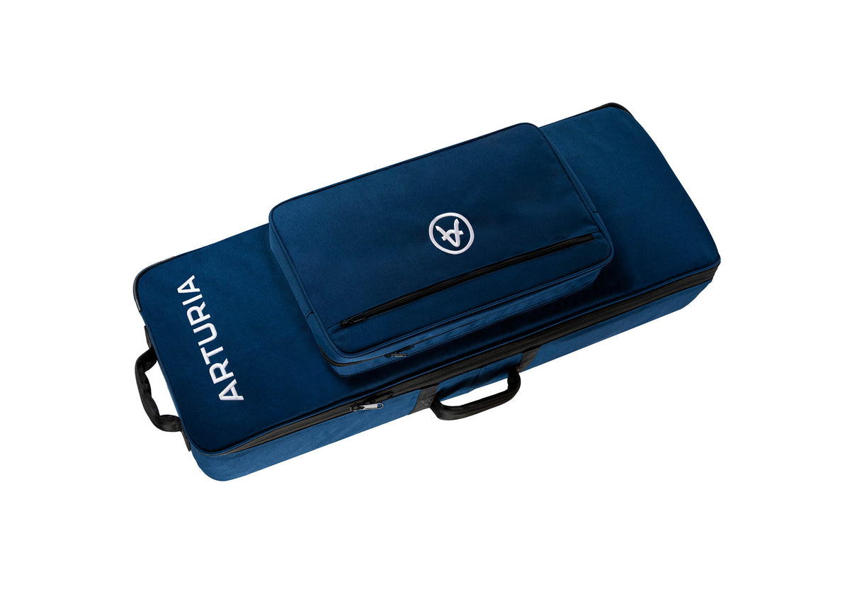 Navy blue padded Arturia Soft Case for 49- and 61-key keyboards, with the Arturia logo, top zip pocket, and carry handles.